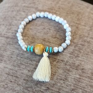 White Howlite Stretch Bracelet with Yellow Accent and Cream Tassel